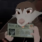 Calum the mouse biting upon his recently issued government ID after he had attended the Census
